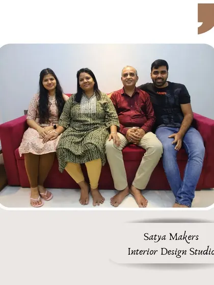 With a smiling family after completing their home interiors in Borivali.