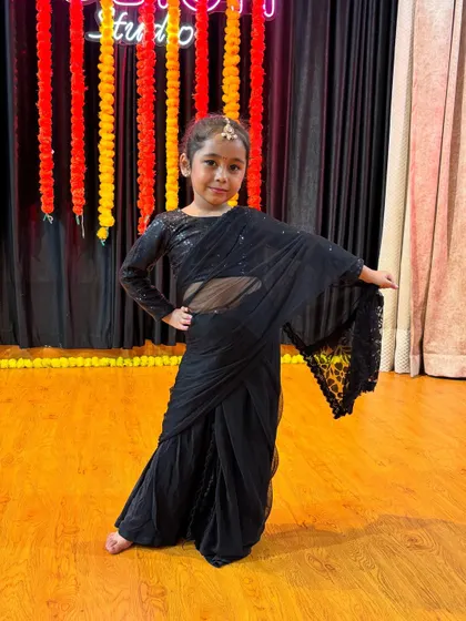 Our little performers dressed up and ready for their end-of-batch video shoot. We love seeing their confidence shine through.
