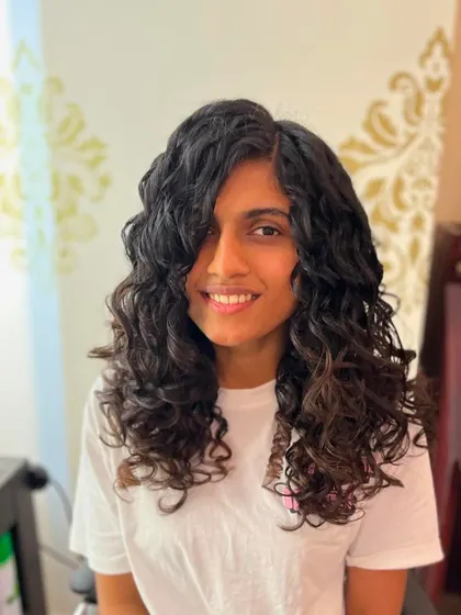 This cut works with the natural curl pattern for an effortless look.