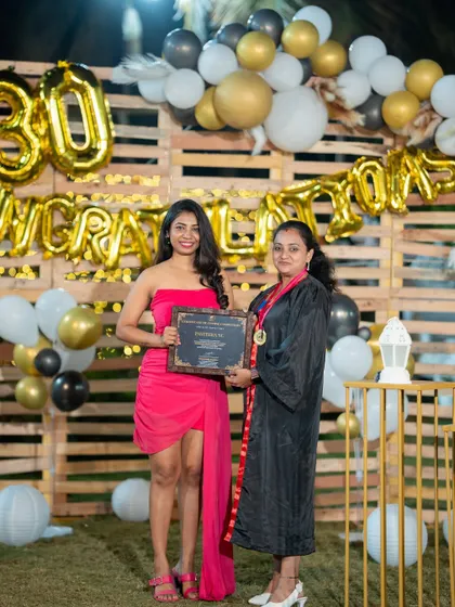 Handing out the certificates is the best part of my job. This student is now a certified professional.
