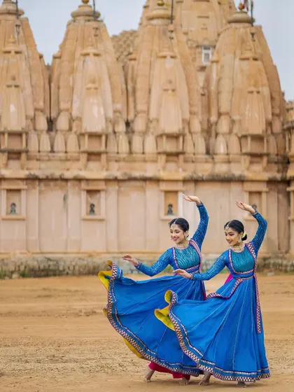 Another shot of the iconic Kathak spin, with our skirts creating a beautiful visual effect. This movement requires great balance and control.