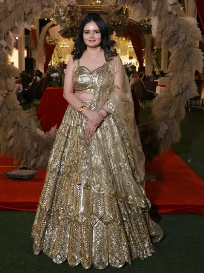 A poised and elegant full-length photo, showcasing the entire glamorous look.