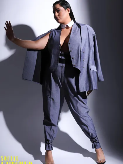A final shot from the editorial, showing a different pose that conveys both strength and ease. Styling for body positivity means finding clothes that celebrate every shape.