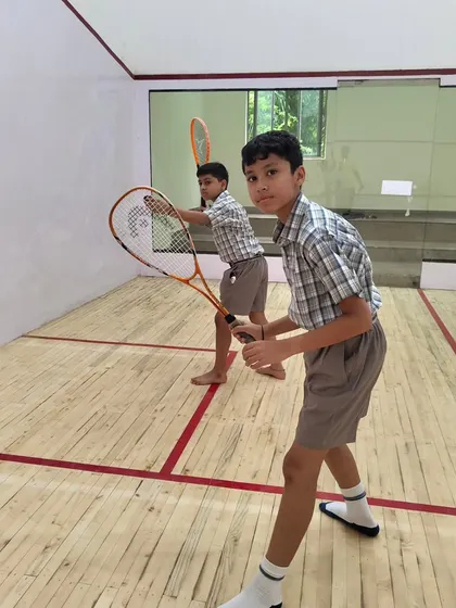 Young players from Ahlcon International School practice their swing form. We start building a strong technical foundation from a very early age.