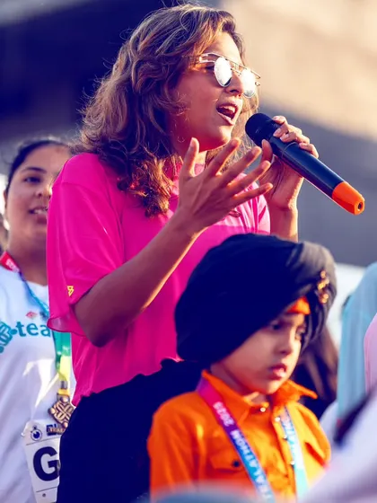 Sharing words of encouragement with the participants, including the young ones, at the Amritsar event.