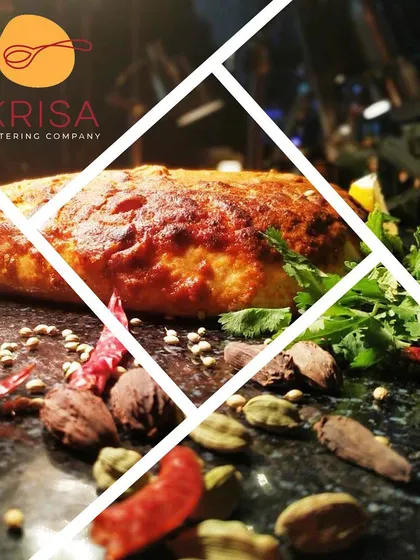 An artistic shot of a baked dish surrounded by whole Indian spices like cardamom, cloves, and star anise. This represents our dedication to authentic flavors and the art of Indian cooking.