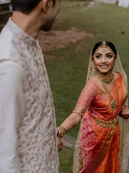 A beautiful, candid moment between the bride and groom. We use natural surroundings and soft light to create portraits that feel both intimate and timeless.