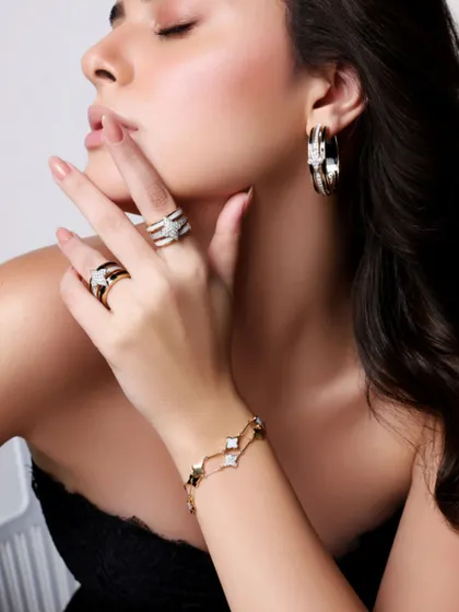 A close-up on the hand, showcasing the elegant rings and bracelet from Farah Khan Atelier. My focus is always on making the jewellery the star.