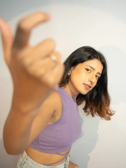 A playful, confident pose.