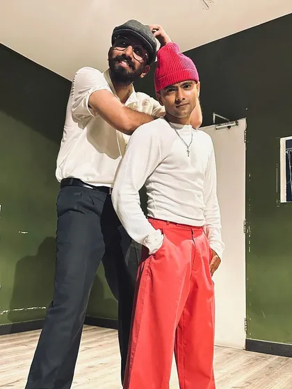 Having some fun with a fellow dancer and friend. We call this our 'Bade Miyaan : Chote Miyaan' moment. The community is built on these friendships and lighthearted moments.