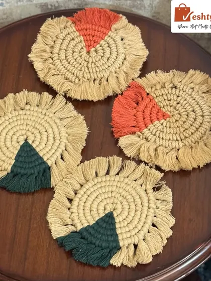 A set of four colorful table coasters, two with orange and two with green. They make a wonderful housewarming gift.