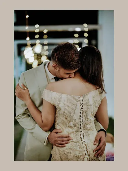 A duplicate of the romantic kiss on the shoulder, a beautifully intimate and artistic shot.