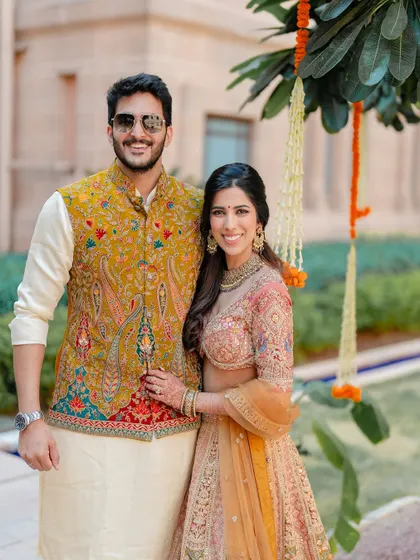 Another lovely couple portrait from a daytime event. The bride's makeup is soft and radiant, with a focus on enhancing her natural, sun-kissed glow.