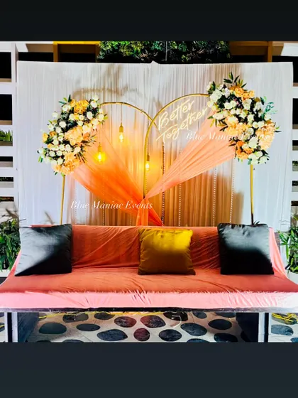 The full view of the heart-shaped arch and swing setup, perfect for a picturesque engagement ceremony.