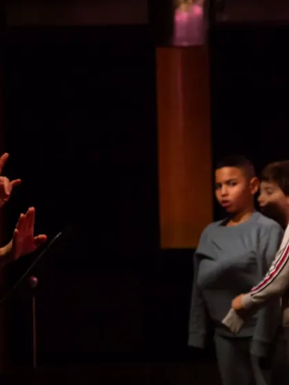 Our artistic director leading a workshop with school children as part of the 'Pajarillo Verde' project. We worked with students to create their own songs on the theme of adoption.