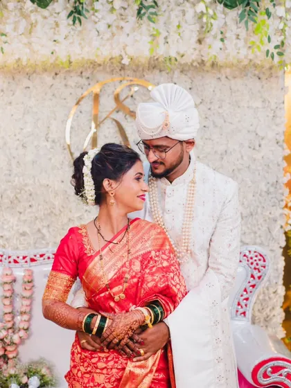 A serene portrait of the couple after their wedding rituals, dressed in their second look for the reception.
