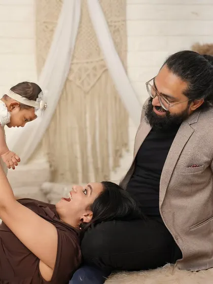 A beautiful family lost in a moment of love. The way these new parents look at their baby is pure magic, and I feel so lucky to capture it.