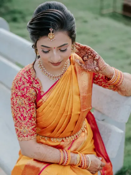 A moment of quiet beauty. I focused on creating a flawless canvas with soft, shimmering eyeshadow and a defined lip, allowing the bride's natural grace to be the focus.
