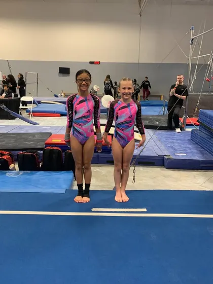 Teammates and friends, these two Xcel Gold athletes supported each other through their first sectional qualifier.