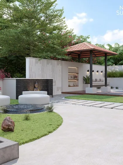 This expansive backyard was designed as a complete outdoor retreat. It features a swimming pool, a covered seating area, a water feature with a Buddha statue, and plenty of green lawn, creating multiple zones for relaxation and meditation.