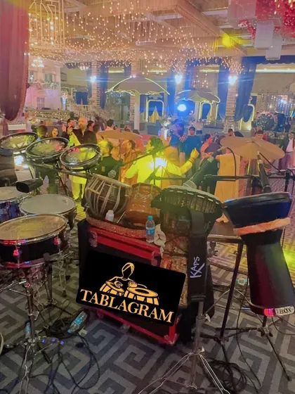 A wide shot of my percussion setup at a beautifully decorated wedding venue. It shows the scale and variety of instruments I bring to an event.