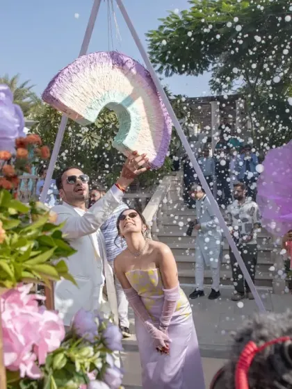A piñata moment for the couple at the carnival. I incorporate playful activities and games that allow the couple and their guests to relax and have fun together.