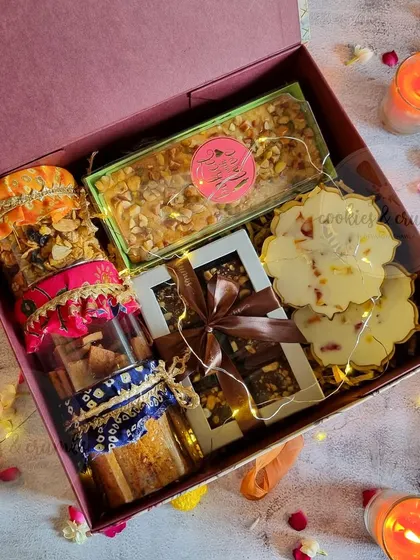 This is what my festive gifting is all about. This packed Diwali hamper includes a bit of everything: nutty tea cakes, assorted chocolates, and other handmade treats, all beautifully boxed up.