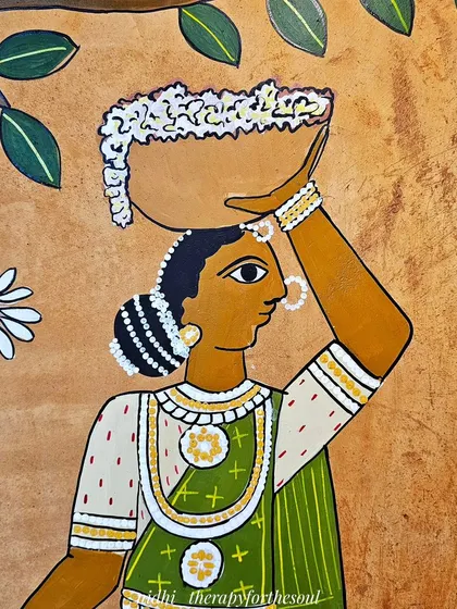 This detail shot shows a woman carrying a pot on her head. I focus on getting the posture and adornments just right to reflect the authentic cultural depiction.