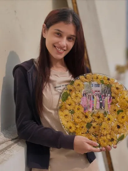 Yellow roses symbolizing friendship, now preserved forever. I created this beautiful circular frame with a group photo and yellow roses for a client to gift to her friend. It’s a celebration of love and friendship.