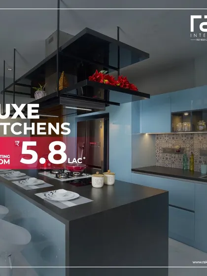 Our luxe kitchens, starting from 5.8 Lac, offer premium design without compromise. This example shows an island kitchen with a sleek black countertop and modern bar stools, perfect for entertaining.