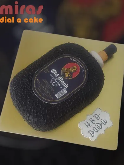A cake for the rum aficionado, expertly sculpted to look like a bottle of Old Monk. This is a fantastic and unique centerpiece for an adult's birthday party.