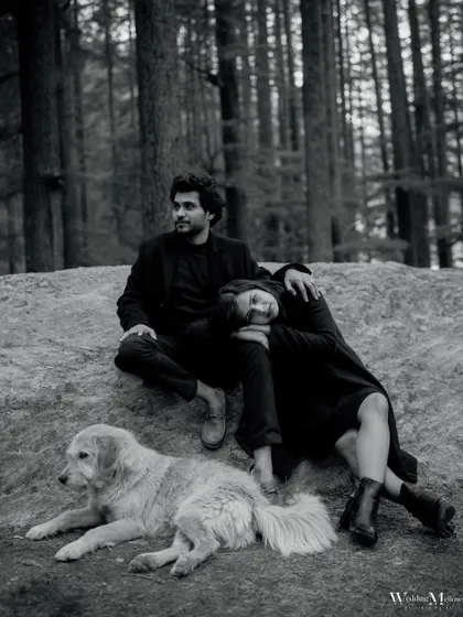 A quiet moment with a furry friend during a pre-wedding shoot in the forests of Manali. We believe in capturing all the elements that make your story special, including beloved pets.