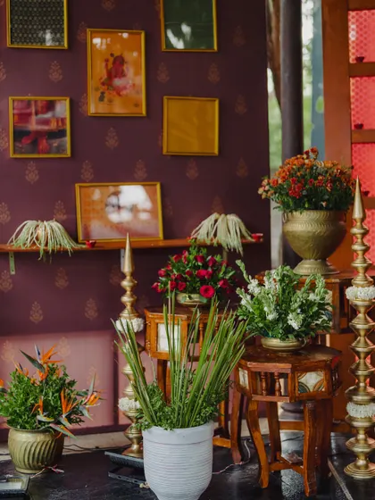 More decor details, showcasing how we use florals, brassware, and unique furniture to create a rich, layered look.