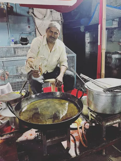 The man behind our tempting Jalebis and Malpua, who always greets you with a smile to make the desserts even sweeter.