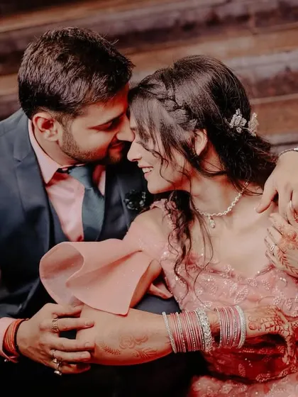 A romantic close-up capturing the intimate connection between the couple during their engagement shoot.