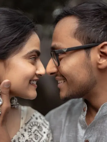 An intimate close-up that captures the love and happiness between a couple. We focus on genuine expressions for authentic pre-wedding portraits.