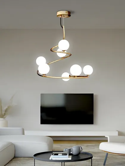This spiral globe chandelier looks great in a minimalist living room, adding a touch of sculptural interest.