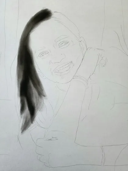 The beginning of a portrait, showing only the hair.