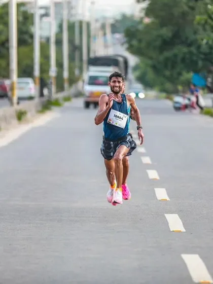A focused runner pushes through the final stretch of the Freedom Run. The determination of our participants is truly inspiring.