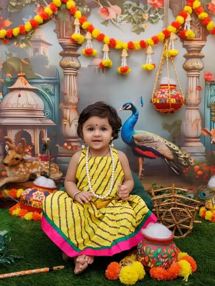 A wide shot showing a little Radha in the complete Gokul setup, giving a sense of the immersive environment I create.