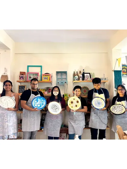 A group of friends and family proudly displaying the moon lamps they created in my studio. This workshop is a wonderful activity for a private get-together, and everyone leaves with a beautiful piece of decor.