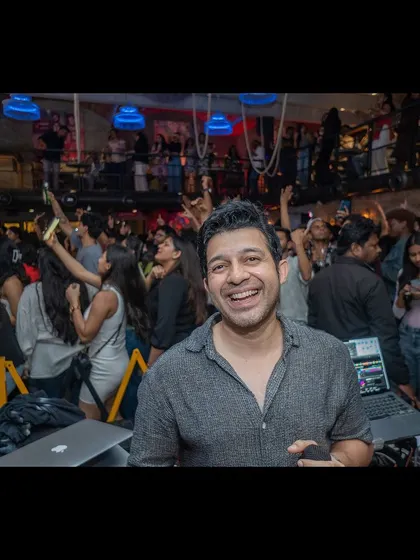 A happy smile from the karaoke console at Watson's Pub. These nights are always so much fun.