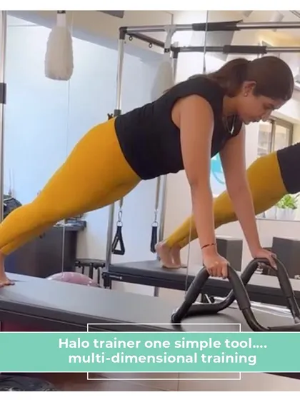 The Halo Trainer is a simple tool that allows for multi-dimensional training. It adds a new level of challenge to exercises like this plank, engaging more muscles and improving stability and core strength.