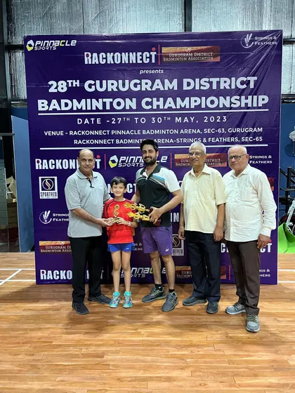 A proud coach-and-student moment, celebrating a win at the Gurugram District Championship.