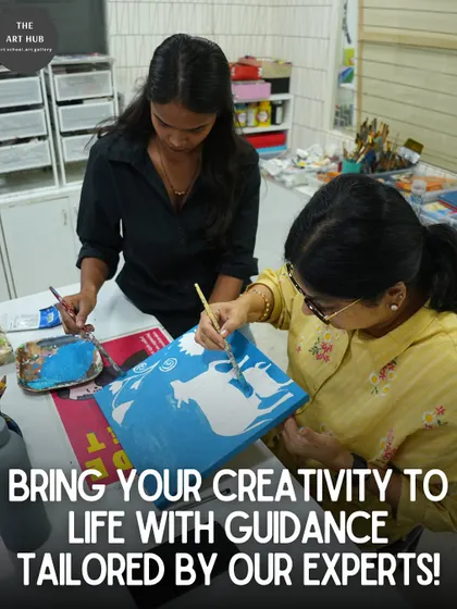 My expert instructors provide tailored guidance to help each student bring their creativity to life. Here, a student receives feedback on her painting technique.
