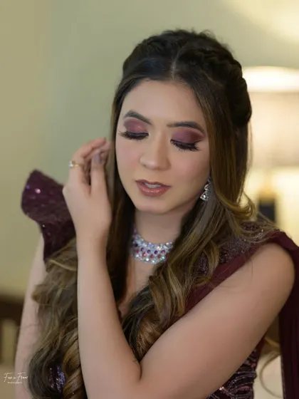 The key to a great eye look is blending. This close-up shows the soft, diffused edges of the maroon eyeshadow, creating depth without harsh lines.