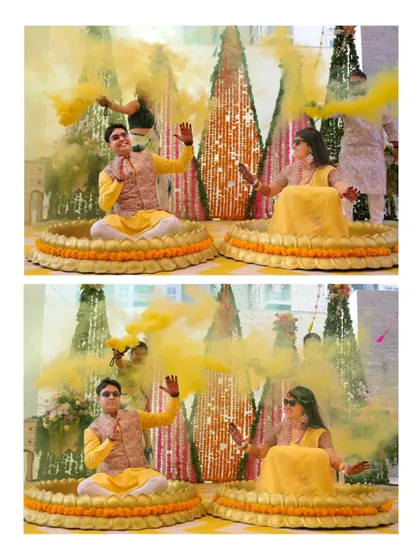 The couple seated in their Haldi thrones, surrounded by yellow smoke bombs. This shot is dramatic, colorful, and full of energy.
