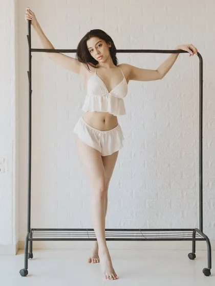A full-body shot that showcases the entire outfit and the model's confident stance.