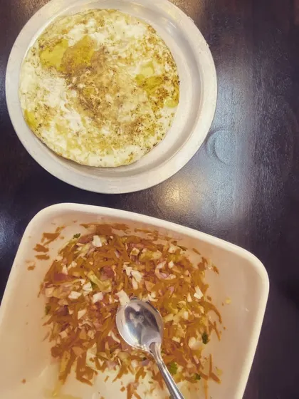 A simple and healthy dinner: an omelet with a side of vegetable salad. Eating right doesn't have to be complicated.
