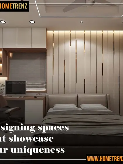 This bedroom design incorporates a study area seamlessly into the layout. The back-lit, fluted panel behind the bed adds texture, while the overhead cabinets provide ample storage.